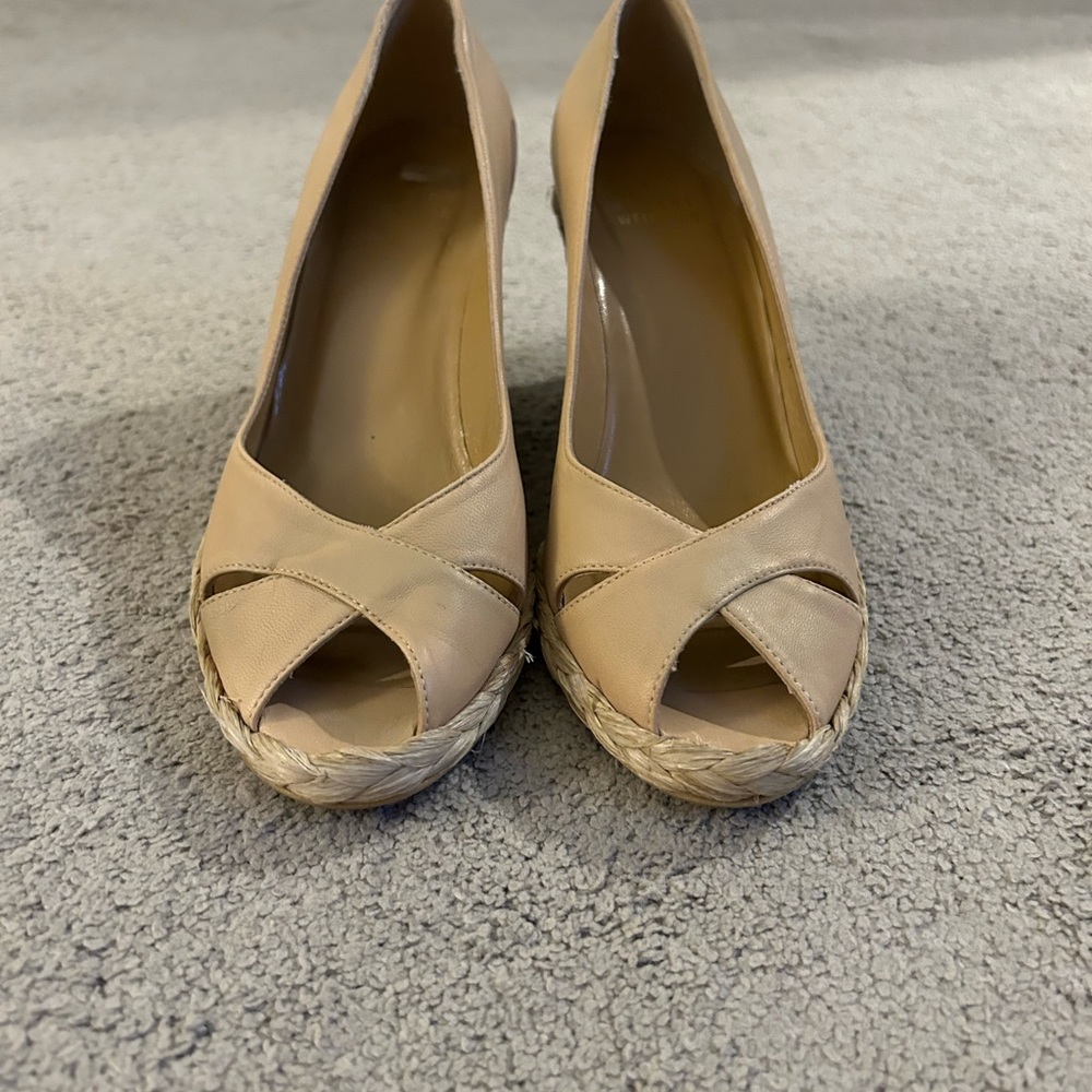 Stuart Weitzman tan wedges with a straw wedge. Size 7